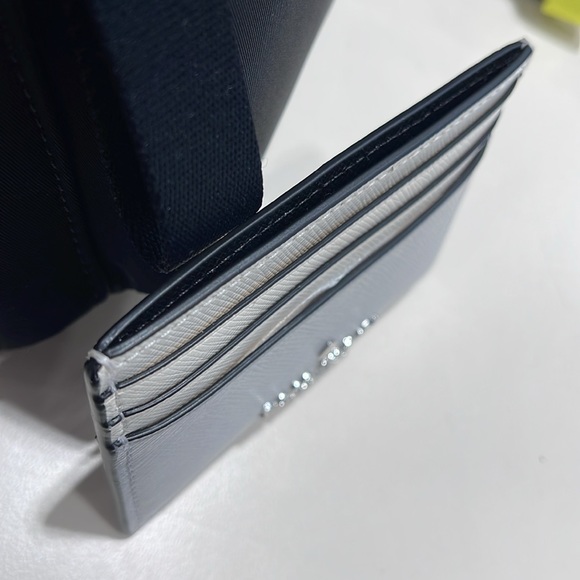 Kate Spade Madison Small Slim Card Holder
Platinum Grey Multi
NWT - Picture 4 of 16